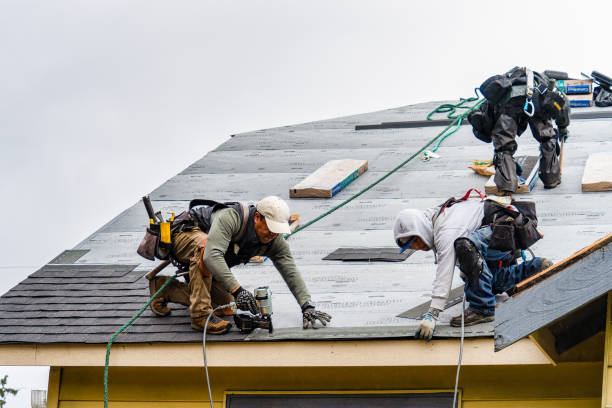 Professional Gutter Installation technician working in West Lebanon, NH